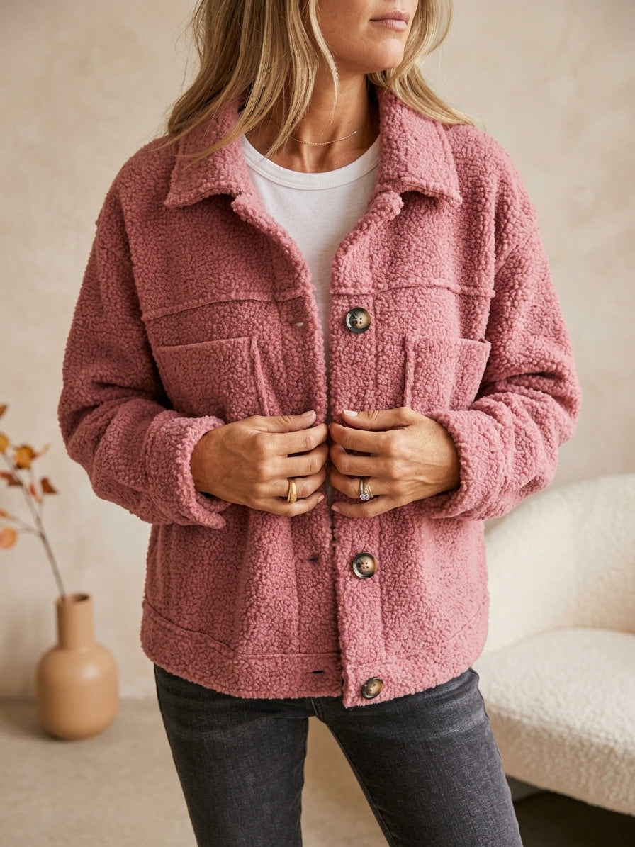 Model wearing pink sherpa cardigan