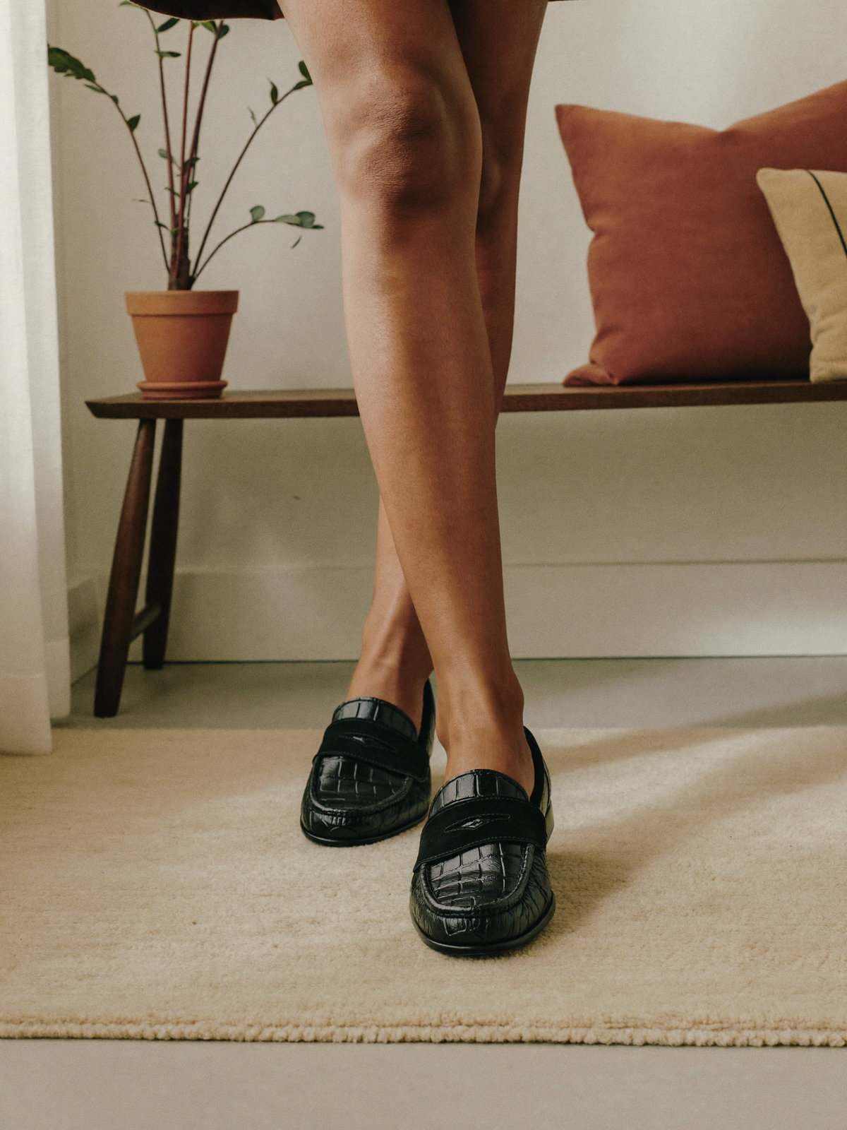 Model wearing formal black shoes