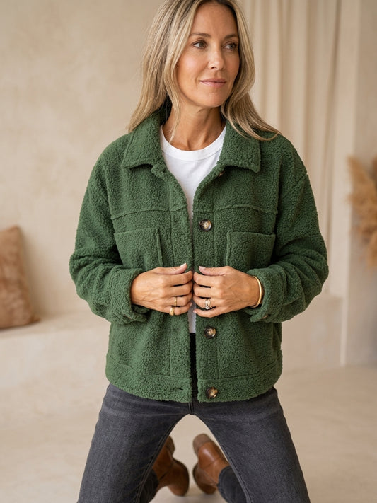 Model wearing green sherpa cardigan