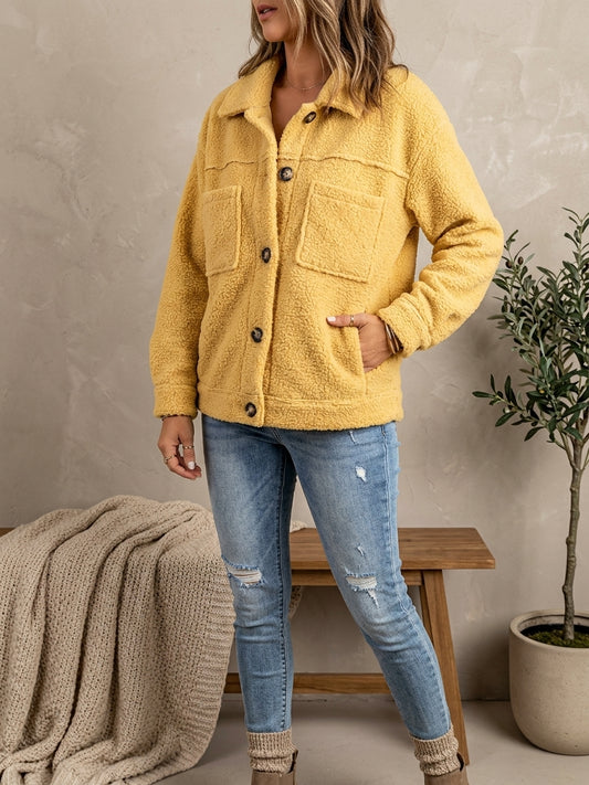 Model wearing yellow sherpa cardigan