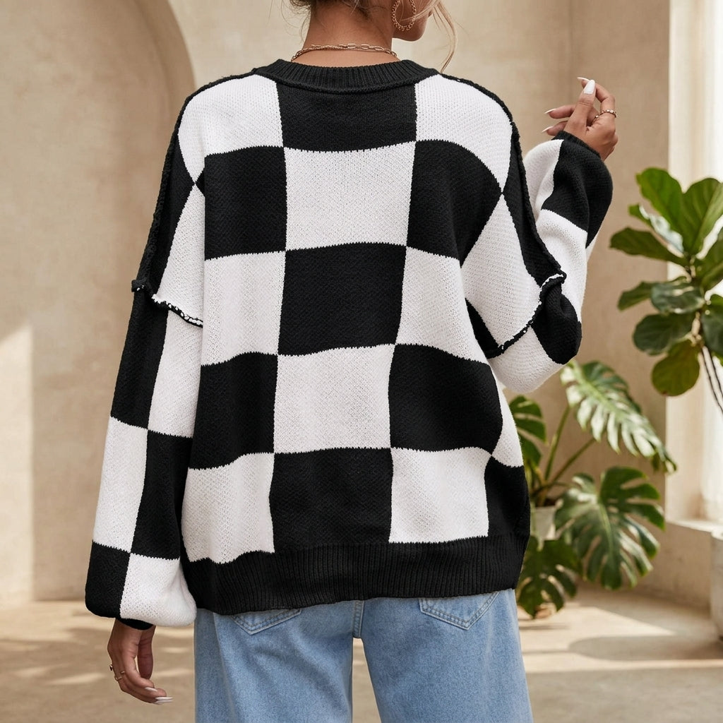 Model wearing black checkerboard sweater