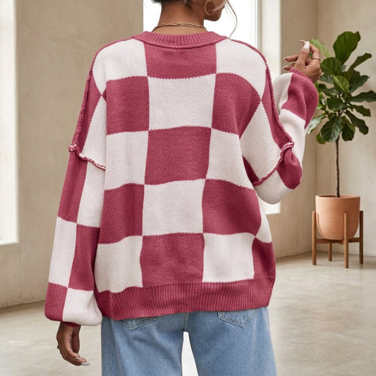 Model wearing dark pink checkerboard sweater