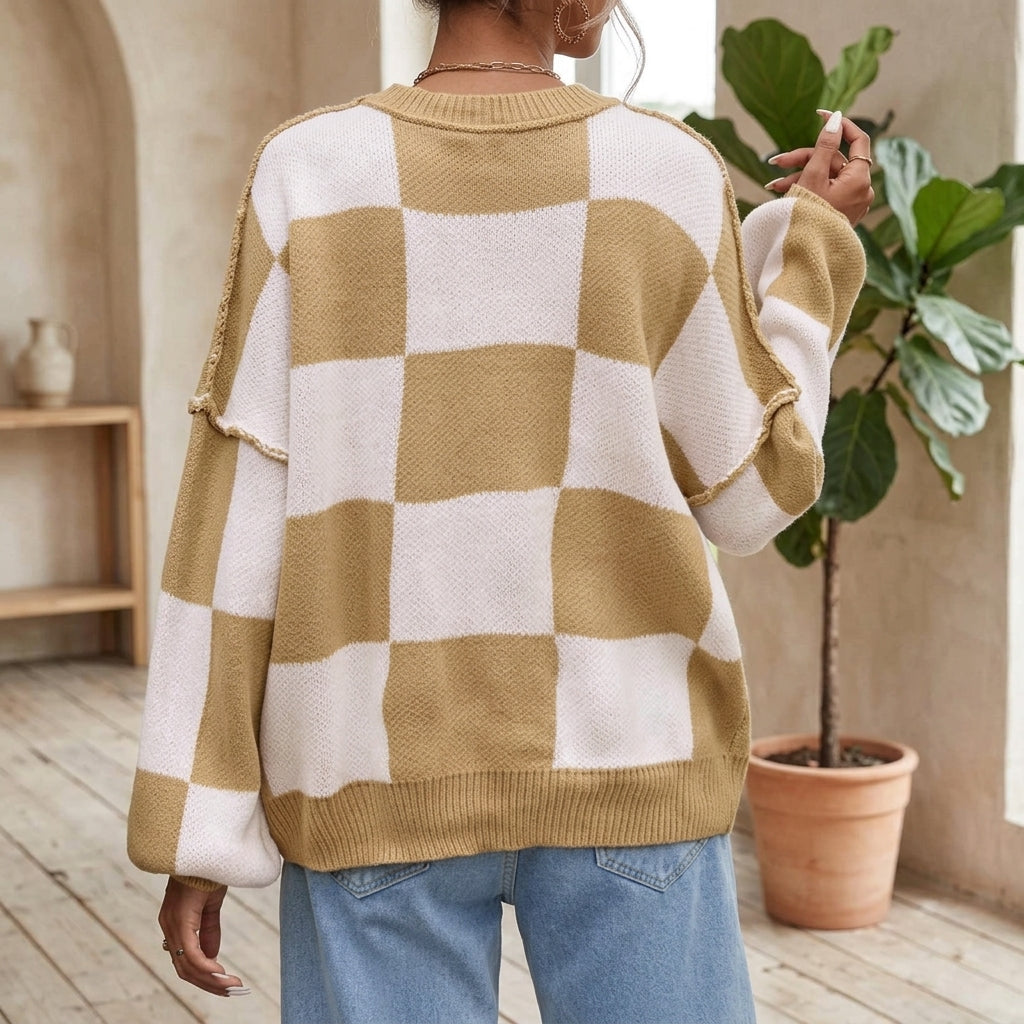 Model wearing khaki checkerboard sweater