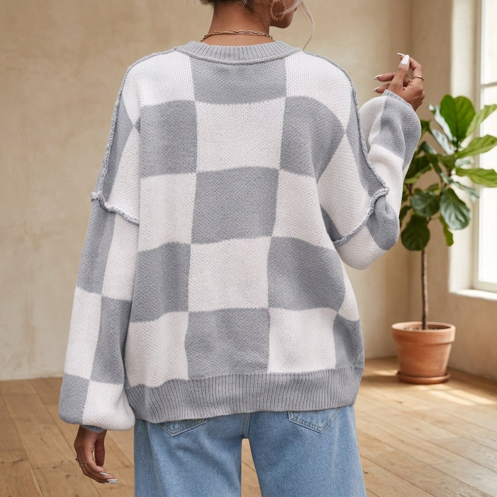 Model wearing light grey checkerboard sweater