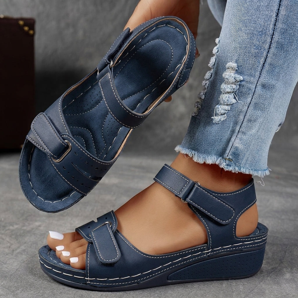 Navy blue comfort wedge sandal with adjustable straps
