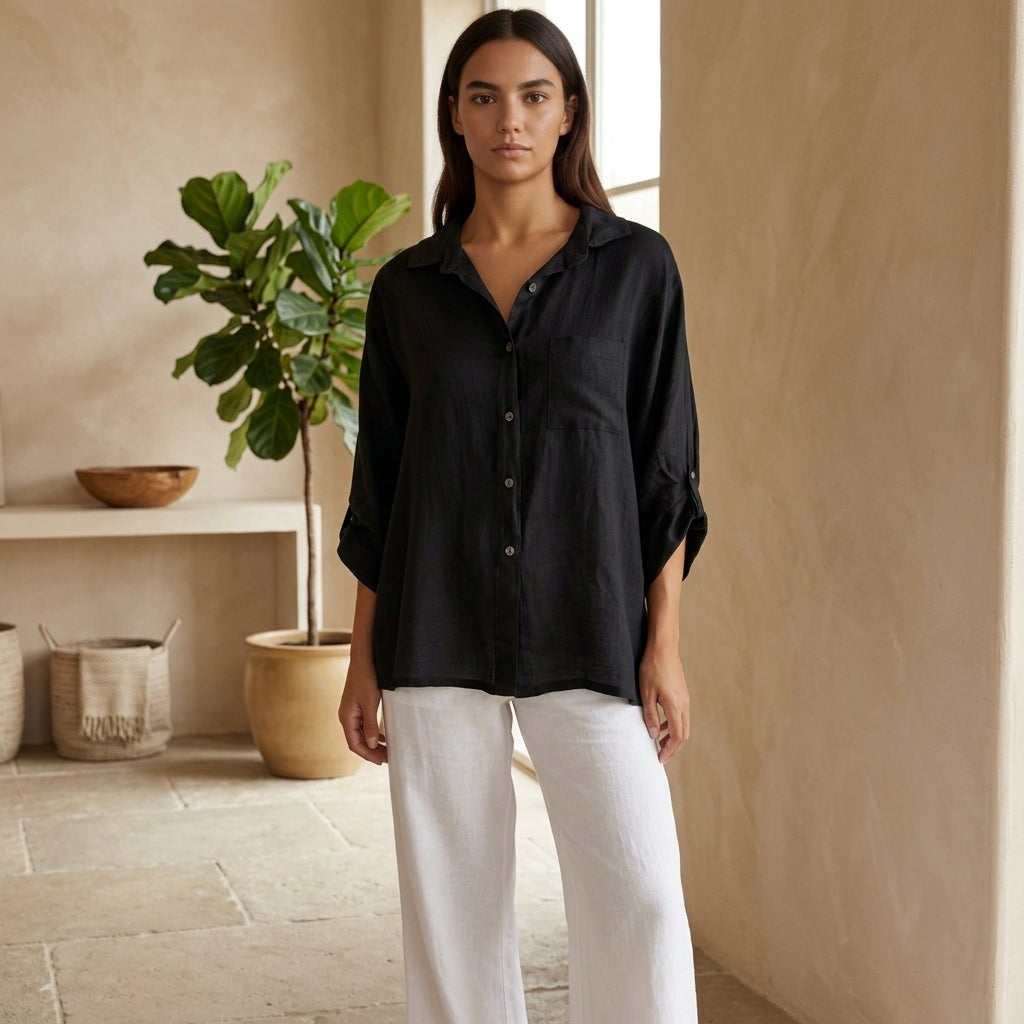 Model wearing black linen blouse