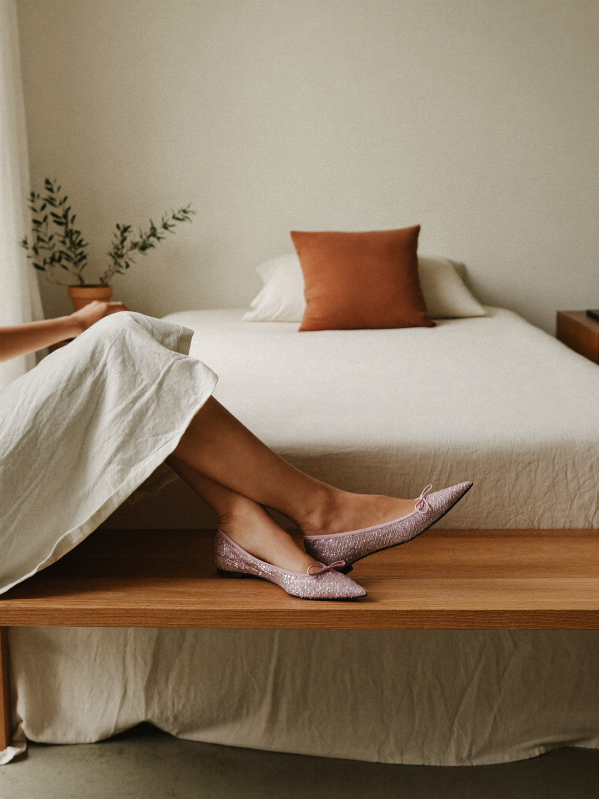 Model wearing pink sequin ballerina flats, lifestyle
