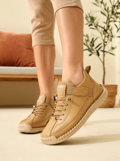 Model wearing beige Mia sneakers