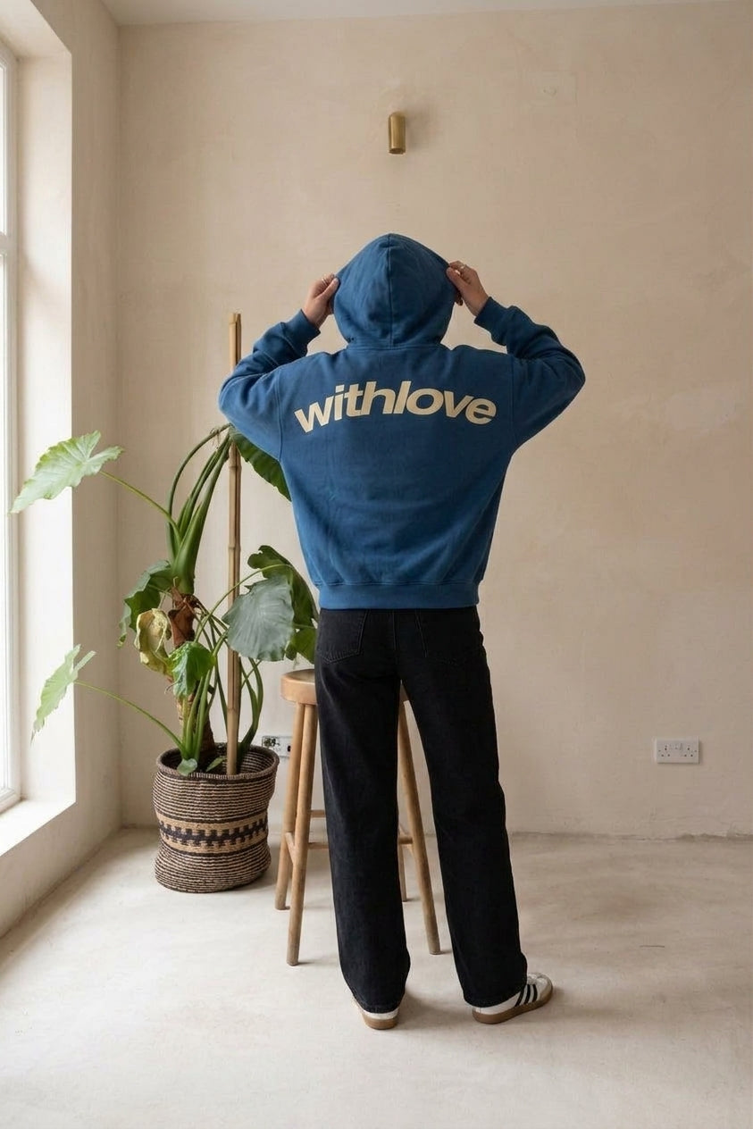 Model wearing blue oversized hoodie