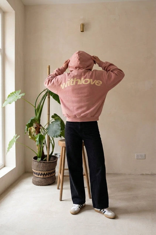 Model wearing pink oversized hoodie