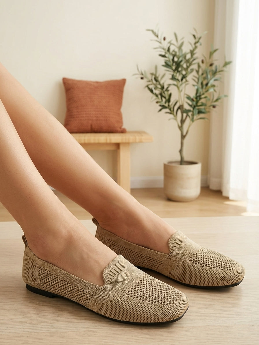 Model wearing khaki knit slip-on flats