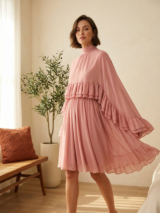 Model wearing pink ruffle mock neck dress