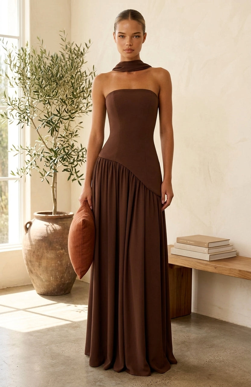 Model wearing brown maxi dress with draped neckline