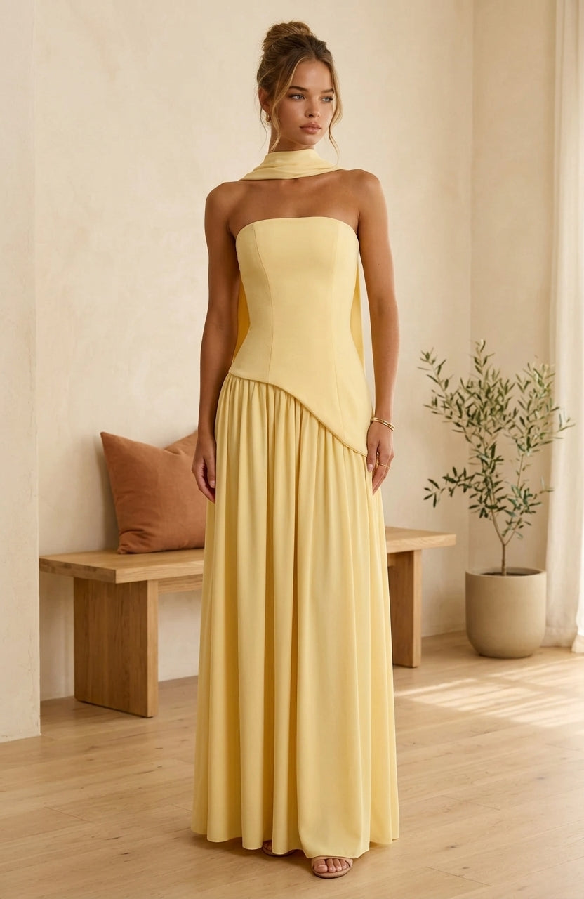 Model wearing yellow maxi dress with draped neckline
