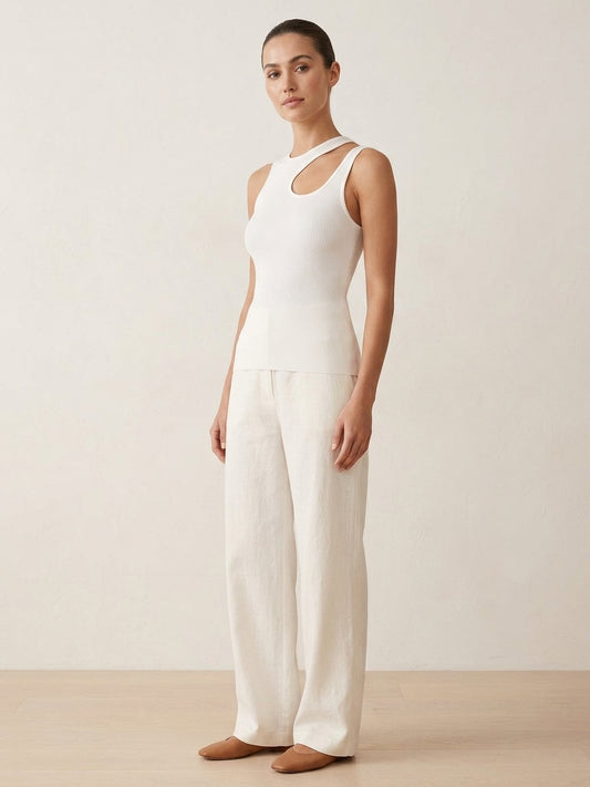 Model wearing white ribbed tank top