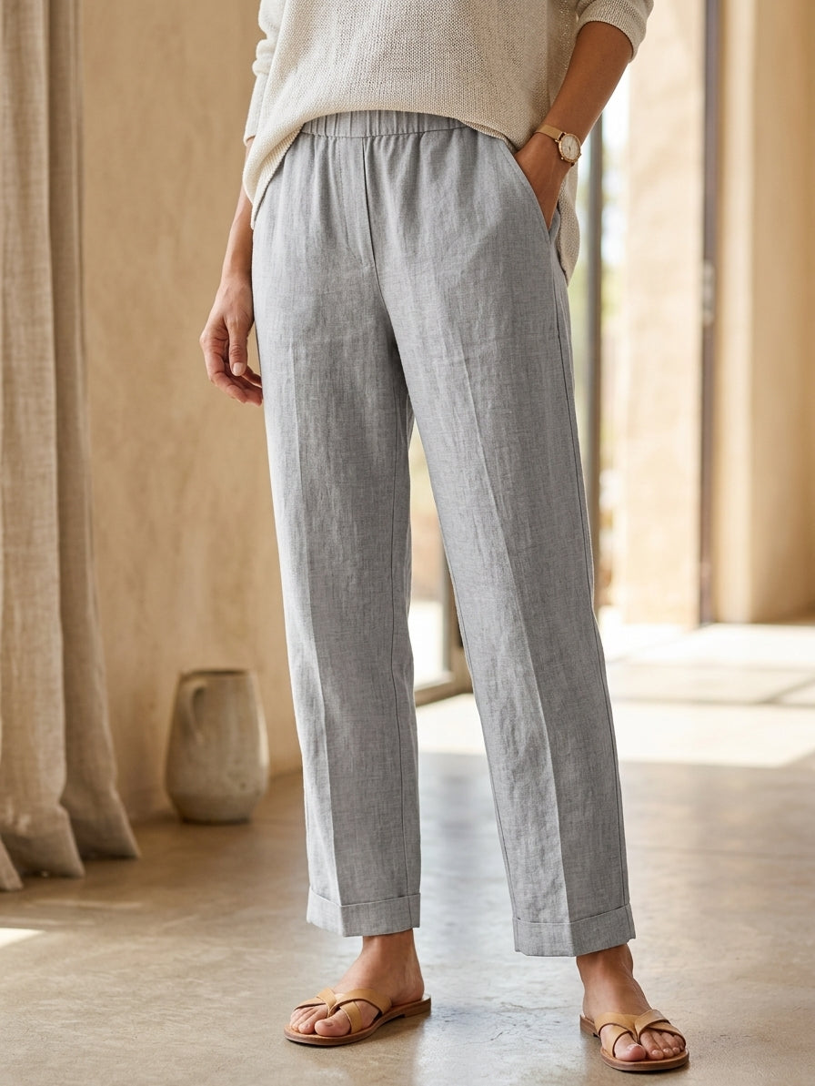 Model wearing gray lightweight summer trousers